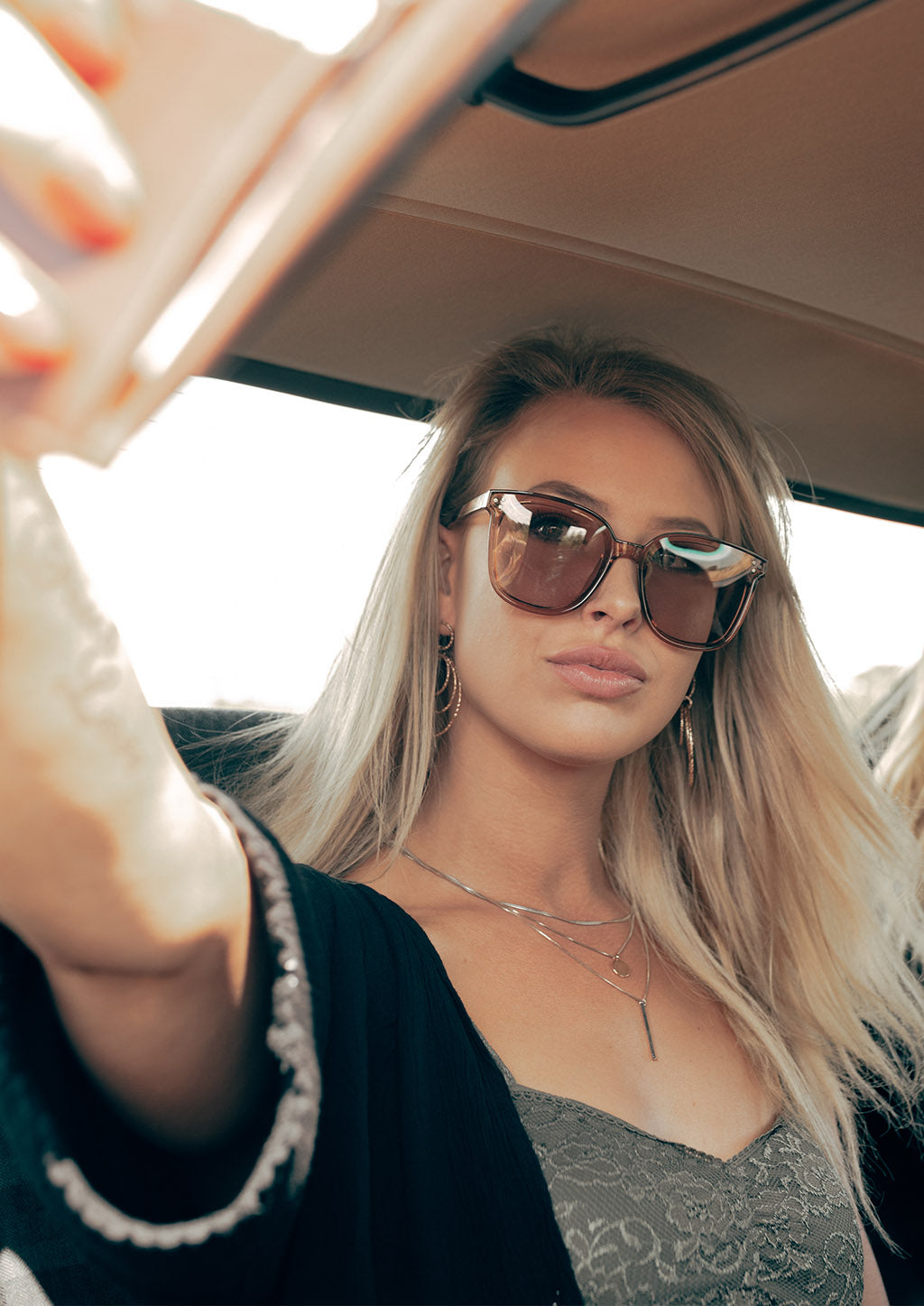 Jasmine Wayfarer sunglasses - On blonde female model doing selfies